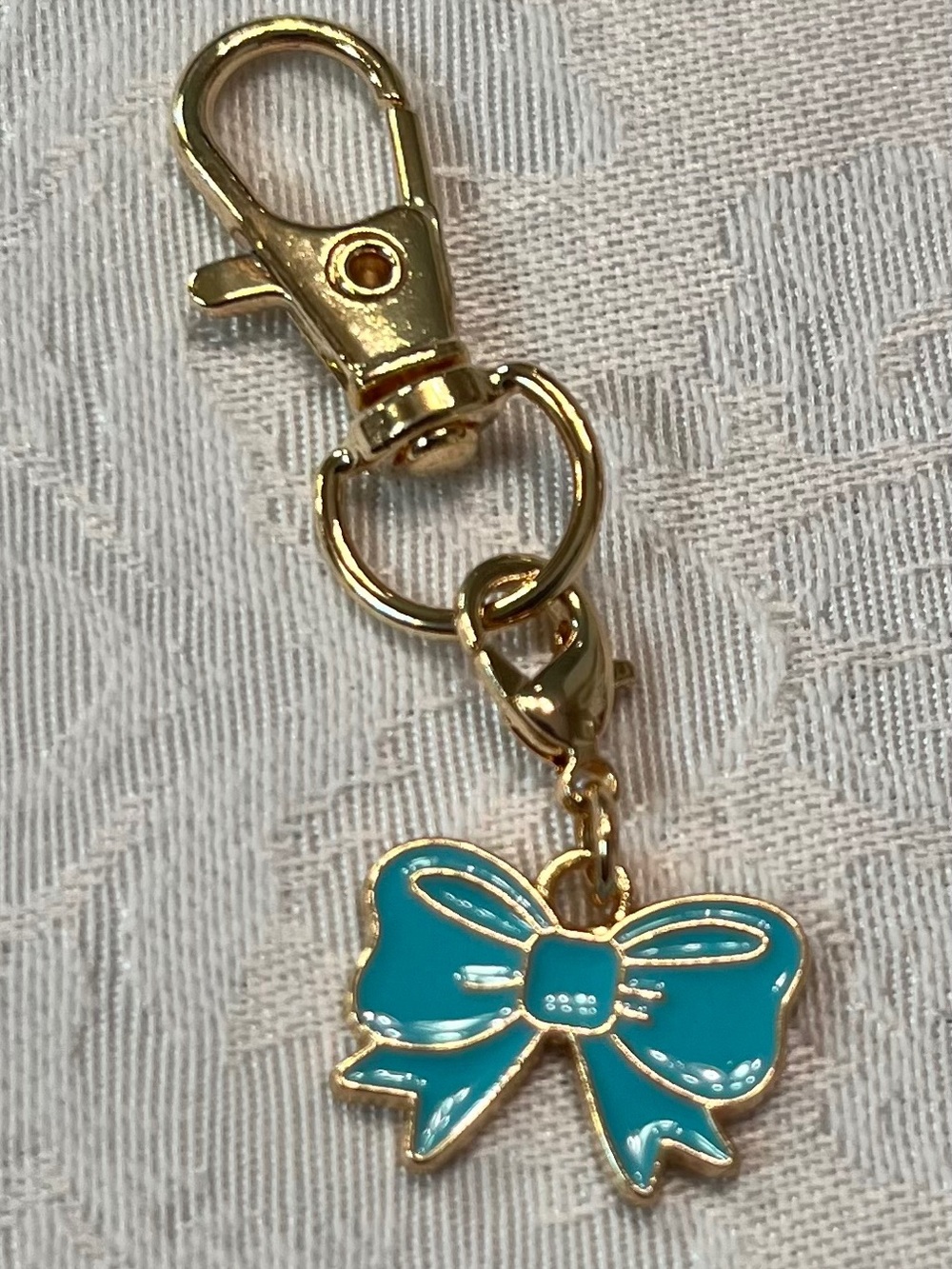 Gold Tone Clip-On Keychain with Enamel Teal Bow Charm